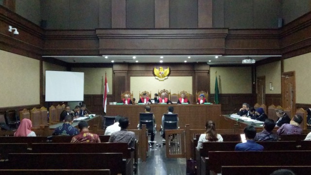 Sidang dakwaan Direktur Operasional Sinar Mas V Wilayah Kalimantan Tengah Willy Agung Adipradhana dan dua penyuap Anggota DPRD Kalimantan Tengah di Pengadilan Tipikor Jakarta. (Foto: Aprilandika Pratama/kumparan)