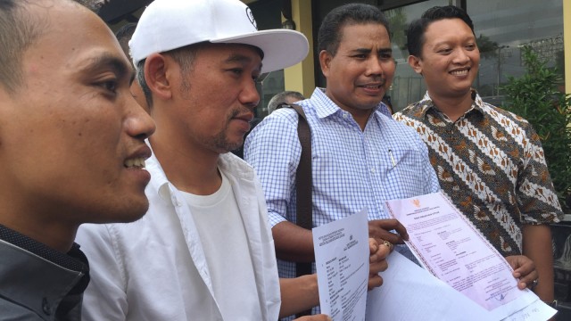 Musisi Marzuki Mohamad atau Kill the DJ melaporkan akun @CakKhum yang penyebar video berisi lagu Jogja Istimewa yang diubah liriknya. (Foto: Arfiansyah Panji Purnandaru/kumparan)