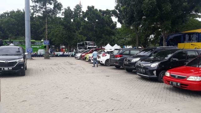 Tukang parkir di kawasan IRTI Monas. (Foto: Raga Imam/kumparan)