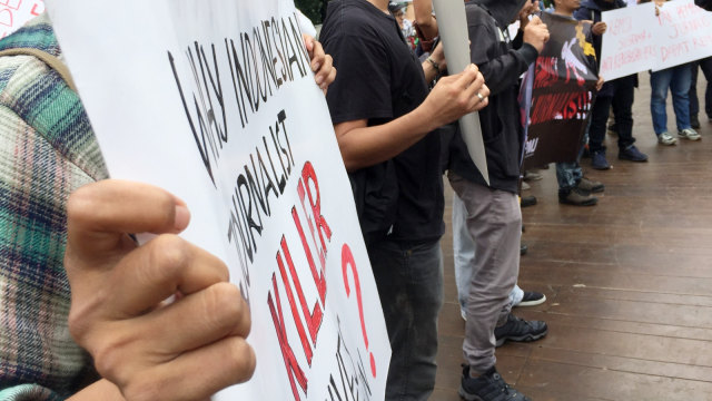 Demo atas kekerasan & pembunuhan terhadap wartawan, Jumat (25/1). Foto: Fachrul Irwinsyah/kumparan