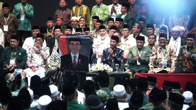 Presiden Jokowi bersama para massa NU di acara Hari Lahir ke-93 NU di JCC Senayan, Jakarta, Kamis (31/1). (Foto: Nugroho Sejati/kumparan )