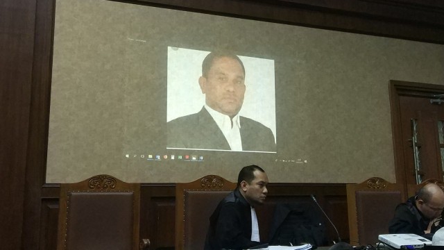 Foto tersangka kasus gratifikasi proyek Dermaga Sabang, panglima GAM di wilayah Sabang, Izil Azhar di tampilkan di Pengadilan Tipikor Jakarta Foto: Adhim Mugni Mubaroq/kumparan