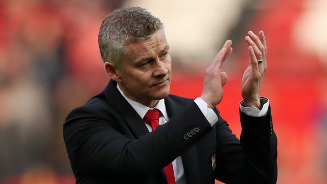 Solskjaer usai mendampingi Manchester United pada pertandingan melawan Liverpool. Foto: Reuters/Lee Smith