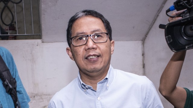 Plt Ketua Umum PSSI Joko Driyono bersiap menjalani pemeriksaan di Ditkrimum Polda Metro Jaya, Jakarta, Rabu (27/2/2019). Foto: ANTARA FOTO/Aprillio Akbar