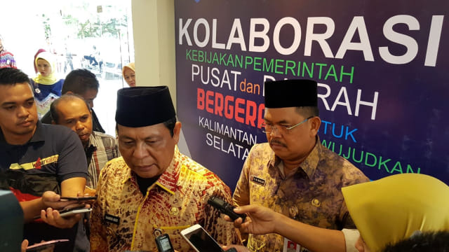 Gubernur Kalsel Sahbirin Noor (kiri) dan Kadinkes Kalsel Muhammad Muslim ketika rakor kesehatan pusat dan daerah di Banjarmasin, Selasa (5/3). Foto: Diananta/banjarhits.id