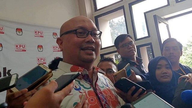 Komisioner KPU, Ilham Saputra. Foto: Fadjar Hadi/kumparan