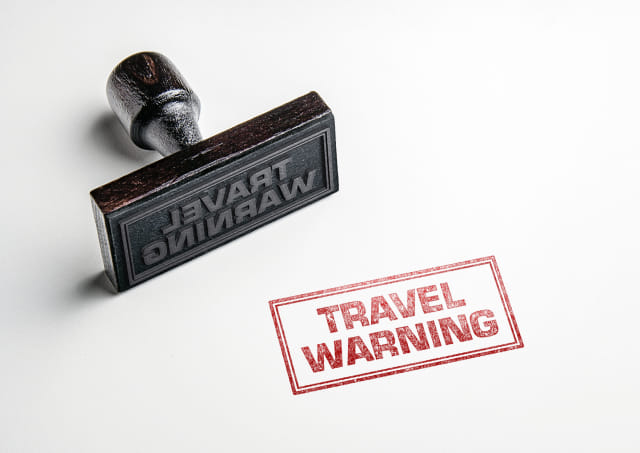 Ilustrasi Travel Warning Foto: Shutter Stock