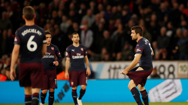 Ekspresi para pemain Arsenal di laga lawan Wolves. Foto: Reuters/Andrew Boyers