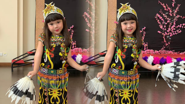 Gempita pakai baju adat Dayak. Foto: Instagram/@gadiiing dan @gisel_la