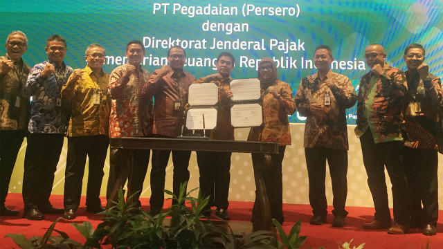 Penandatanganan Program Integrasi Data Perpajakan antara PT Pegadaian (Persero)  dengan Direktorat Jenderal Pajak (DJP). Foto: Selfy Sandra Momongan/kumparan