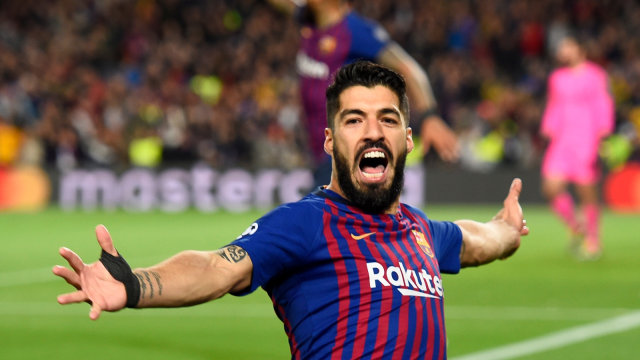 Luis Suarez merayakan gol ke gawang Liverpool. Foto: AFP/Josep Lago