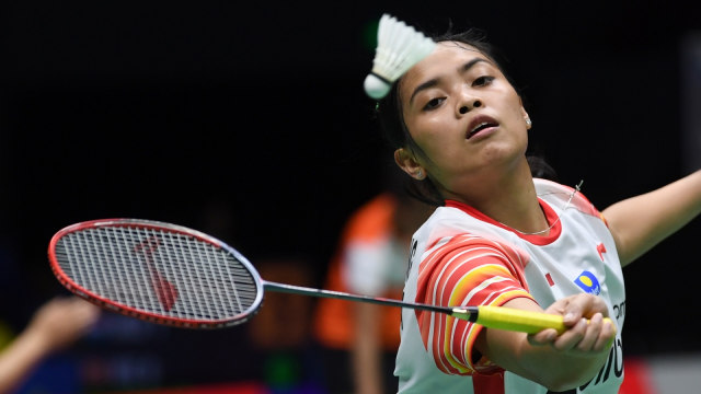 Pebulu tangkis tunggal putri Indonesia Gregoria Mariska Tunjung mengembalikan kok pada babak penyisihan grup 1B Piala Sudirman 2019 di Guangxi Sports Center Gymnasium, Nanning, China, Minggu (19/5). Foto: ANTARA FOTO/Wahyu Putro A