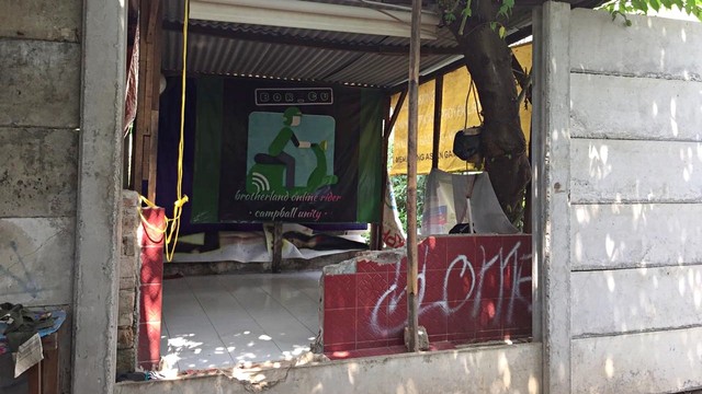 Pangkalan ojek di Kampung Bali, lokasi pengemudi ojek bernama Iyo yang ikut diciduk polisi saat tertidur. Foto: Muhammad Lutfan Darmawan/kumparan