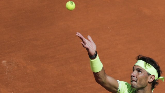 Aksi Rafael Nadal di Prancis Terbuka. Foto: Thomas SAMSON / AFP