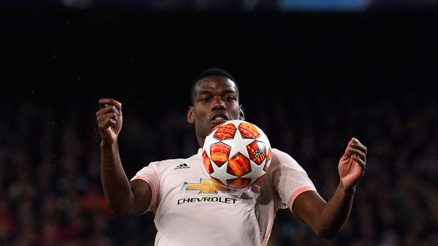 Aksi Pogba di laga vs Barcelona. Foto: AFP/Josep Lago