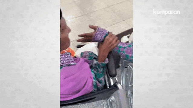 Jemaah asal ambon Mahmud Sopamena,87, enggan berpisah dari istrinya Kalsum Litiloli, 75, ketika tiba di bandara Madinah, Arab Saudi Foto: Dok. Istimewa