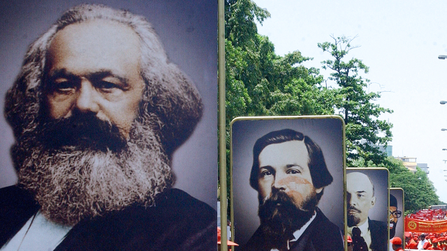 Ilustrasi Marxisme. Foto: AFP/SANKA VIDANAGAMA