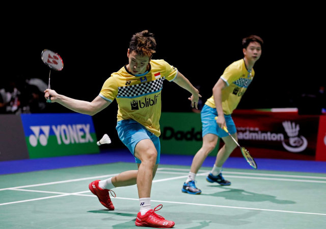 Ganda putra Indonesia Kevin Sanjaya Sukamuljo dan Marcus Fernaldi Gideon. Foto: REUTERS/Arnd Wiegmann