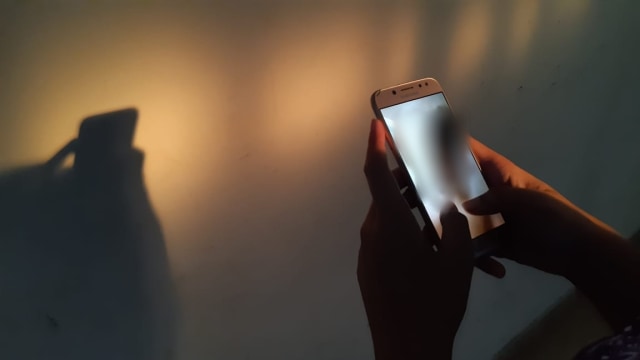 Ilustrasi video mesum yang diduga diperankan oknum pegawai bank di Palembang (Foto: abp/Urban id)