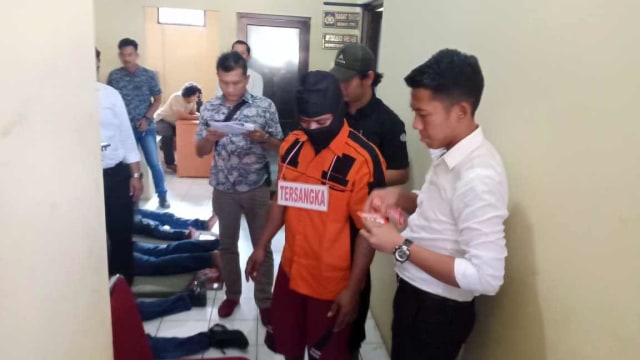 Rekonstruksi pembunuhan keluarga di Serang. Foto: Dok. Istimewa