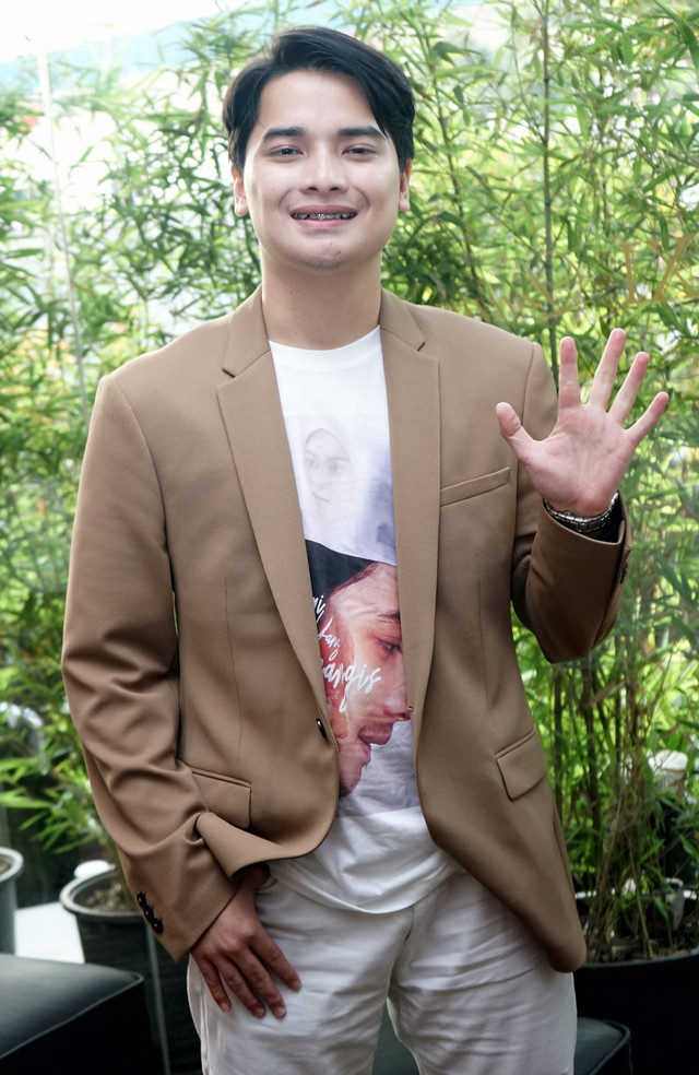 Anak Almarhum Ustaz Arifin Ilham, Alvin Faiz saat hadir di screening film 'Suami Yang Menangis' di Epicentrum, Jakarta, Selasa, (27/8). Foto: Ronny/kumparan