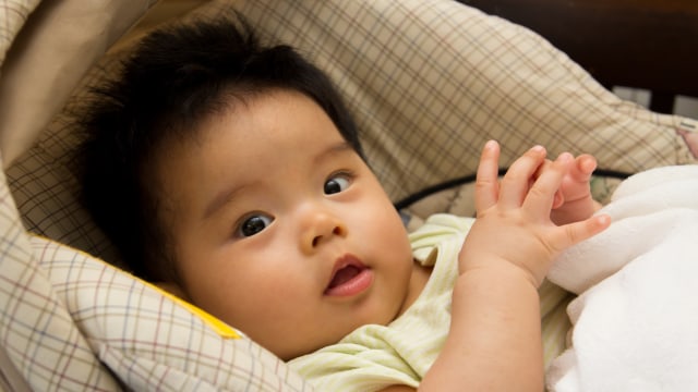 Ilustrasi bayi di car seat. Foto: Shutter Stock