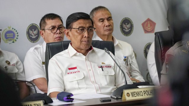 Menko Polhukam Wiranto saat melakukan konferensi pers di Kemenkopolhukam terkait revisi UU KPK. Foto: Jamal Ramadhan/kumparan