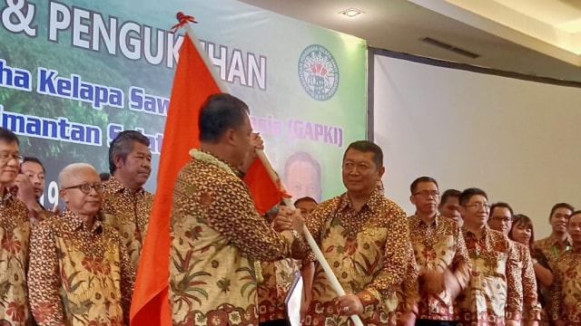 Pengukuhan pengurus GAPKI Kalsel di Hotel Rattan Inn, Banjarmasin pada Rabu (2/10/2019). Foto: Donny Muslim/banjarhits.id