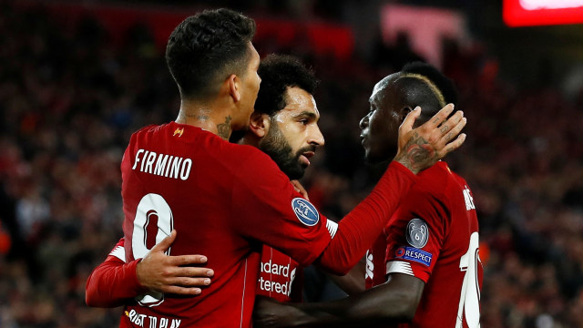 Firmino, Mane, Salah merayakan gol Liverpool. Foto: Action Images via Reuters/Jason Cairnduff