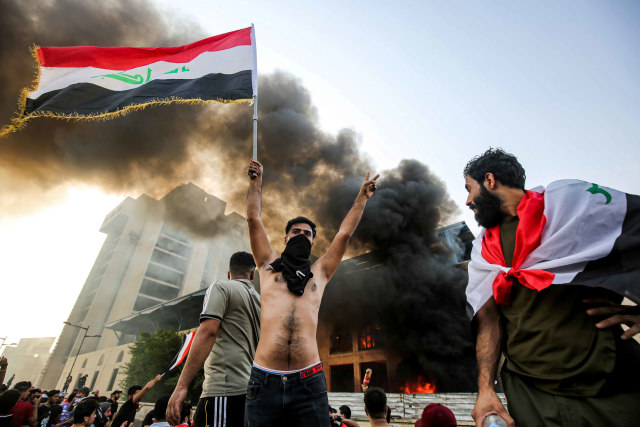 Demonstran di Baghdad. Foto: AFP/AHMAD AL-RUBAYE