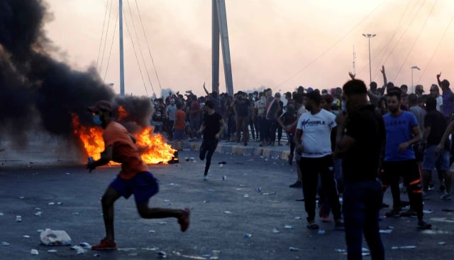 Suasana kerusuhan di Baghdad, Irak. Foto: Reuters
