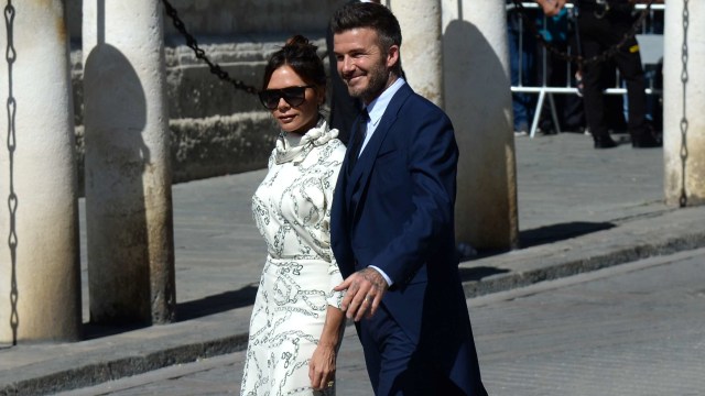 Victoria Beckham dan David Beckham. Foto: AFP