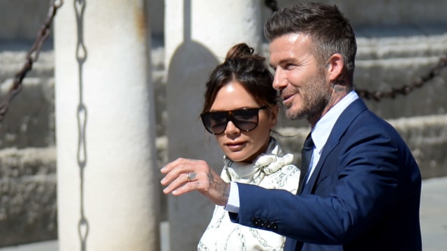 Victoria Beckham dan David Beckham. Foto: AFP