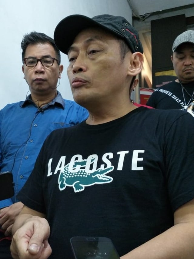 Ninoy Karundeng di Polda Metro Jaya, Jakarta Selatan, Jumat (18/10).  Foto: Fachrul Irwinsyah/kumparan