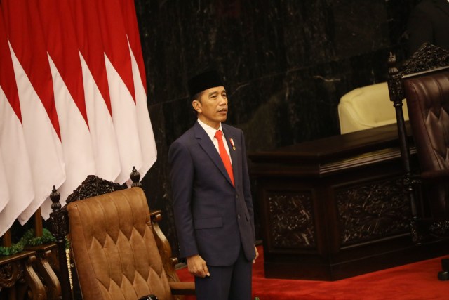 Presiden Joko Widodo saat mengikuti pelantikan Presiden dan Wakil Presiden di Kompleks Parlemen, Senayan, Jakarta, Minggu (20/10). Foto: Jamal Ramadhan/kumparan 