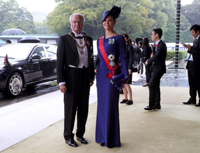 Raja Carl XVI Gustaf dan Putri Mahkota Victoria dari Swedia. Foto: Koji Sasahara/ AFP