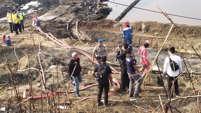 Tim Puslabfor dari Mabes Polri bersama jajaran Polres Cimahi melakukan olah TKP di lokasi terjadinya kebakaran di Cimahi. Foto: Rachmadi Rasyad/kumparan