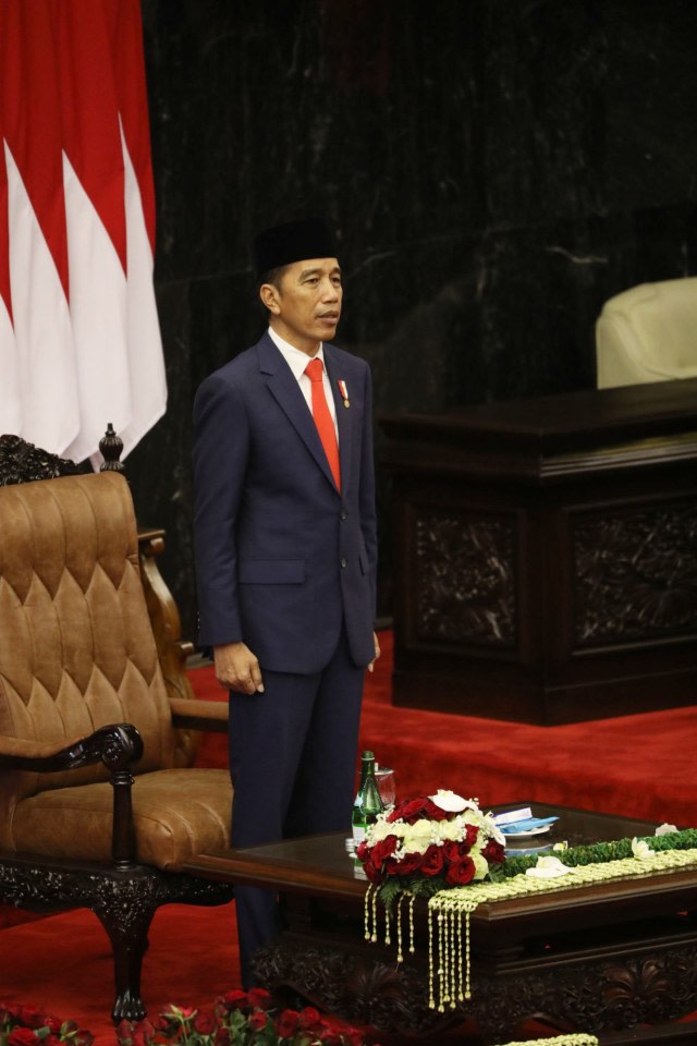 Presiden Joko Widodo saat mengikuti pelantikan Presiden dan Wakil Presiden di Kompleks Parlemen, Senayan, Jakarta, Minggu (20/10). Foto: Jamal Ramadhan/kumparan 