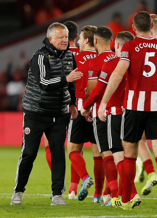 Chris Wilder menyemangati pemain-pemain Sheffield United. Foto: Reuters/Andrew Yates