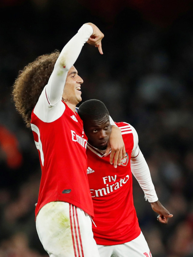 Matteo Guendouzi merayakan gol bersama Nicolas Pepe. Foto: Reuters/Andrew Boyers