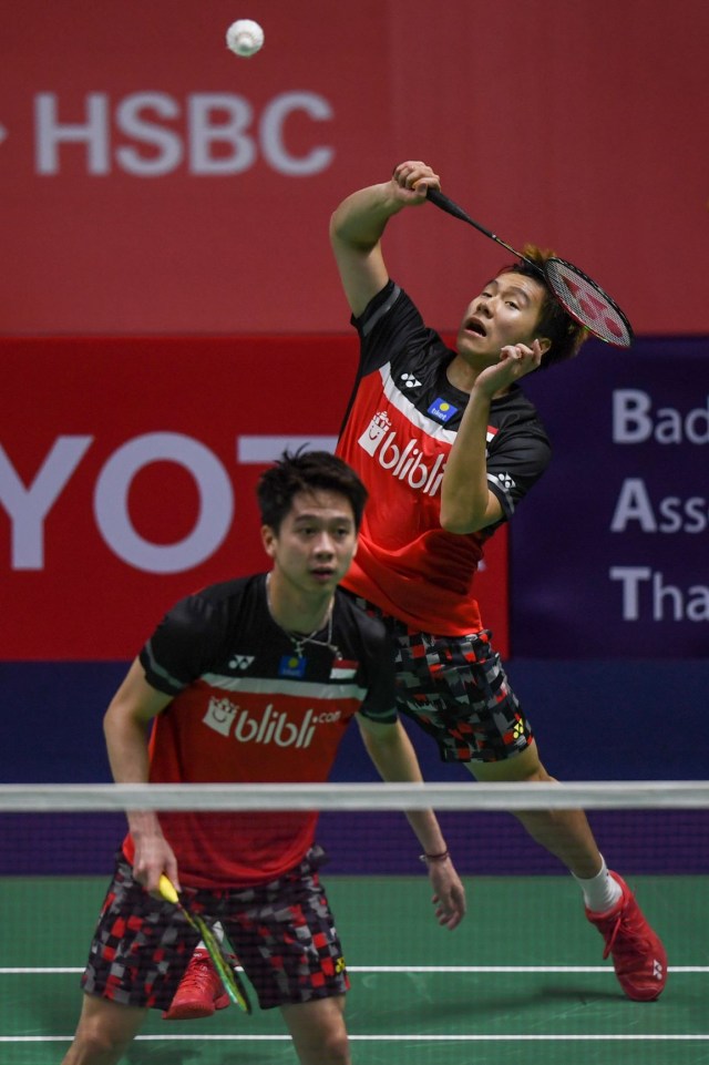 Ganda putra Indonesia, Marcus/Kevin. Foto: Chalinee Thirasupa / AFP