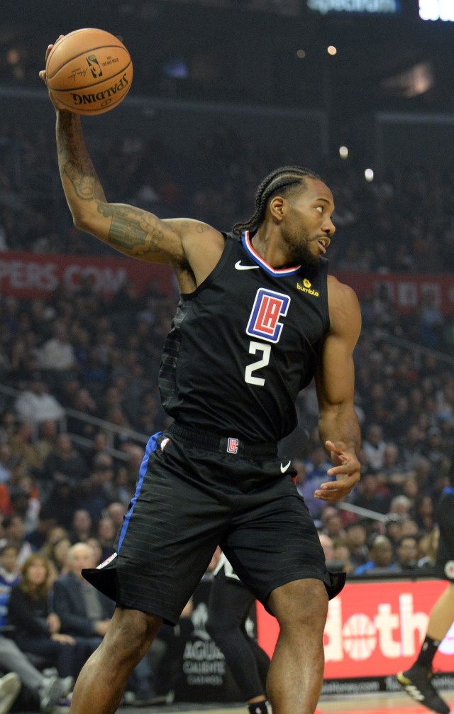 Aksi Kawhi Leonard dalam pertandingan Clippers vs Spurs. Foto: USA Today/Reuters/Gary A. Vazquez
