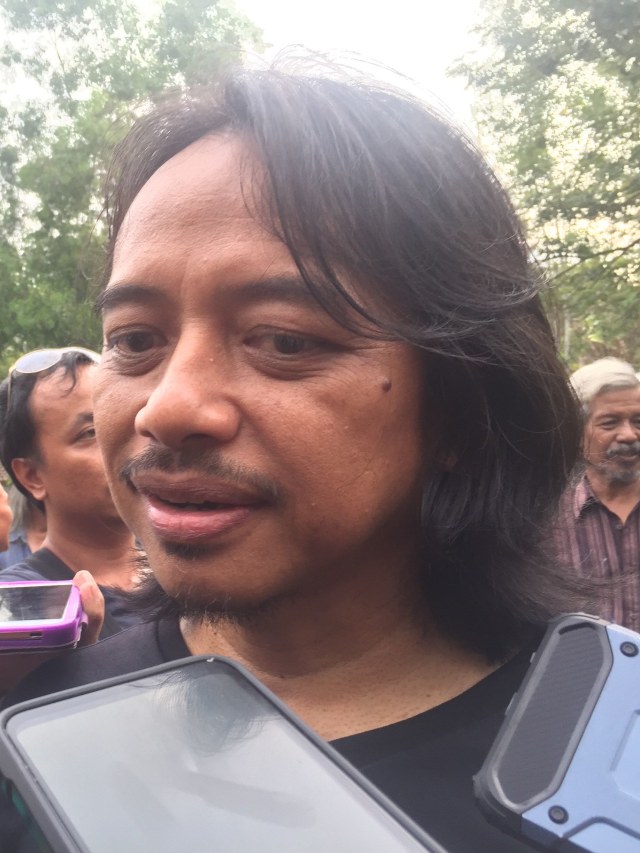 Gitari Gigi, Dewa Budjana. Foto: Arfiansyah Panji Purnandaru/kumparan