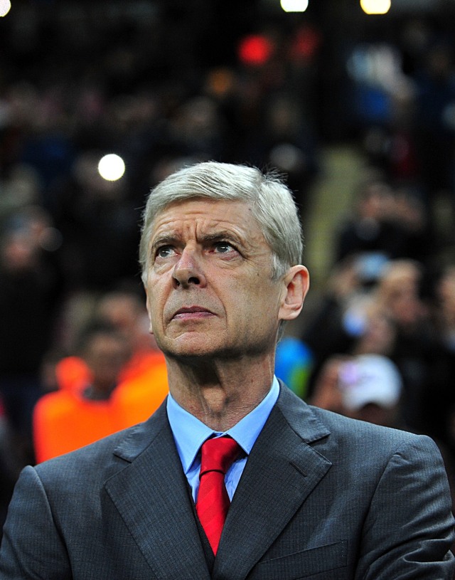 Arsene Wenger kala masih menjadi pelatih Arsenal. Foto: AFP/Ozan Kose