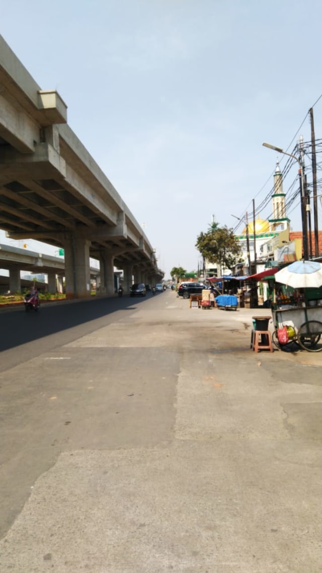 Suasana Jalan Kalimalang, yang akan diterapkan jalan berbayar atau Electronic Road Pricing (ERP).
 Foto: Fachrul Irwinsyah/kumparan