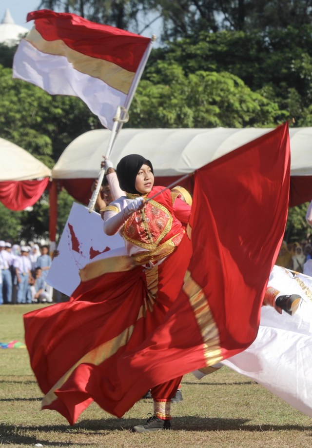 Penampilan Marching Band pada peringatan Hari Pendidikan Daerah (Hardikda) Aceh ke-60 di Lapangan Tugu, Darussalam, Banda Aceh. Foto: Suparta/acehkini