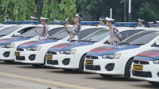 Sejumlah anggota kepolisian mengikuti apel kesiapan menjelang Operasi Natal dan Tahun Baru (Nataru) 2019 di Parkir Timur Senayan, Jakarta. Foto: Helmi Afandi Abdullah/kumparan