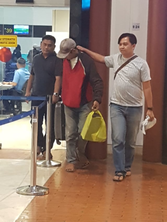 Pelaku saat ditangkap di Bandara Soekarno Hatta (IST)