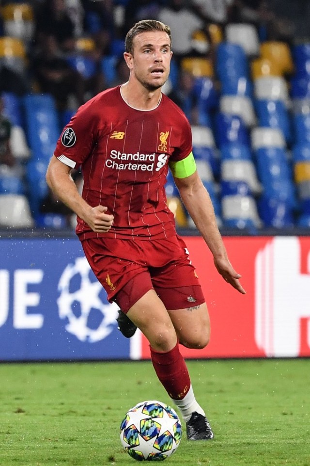 Kapten Liverpool, Jordan Henderson.  Foto: Andreas SOLARO / AFP