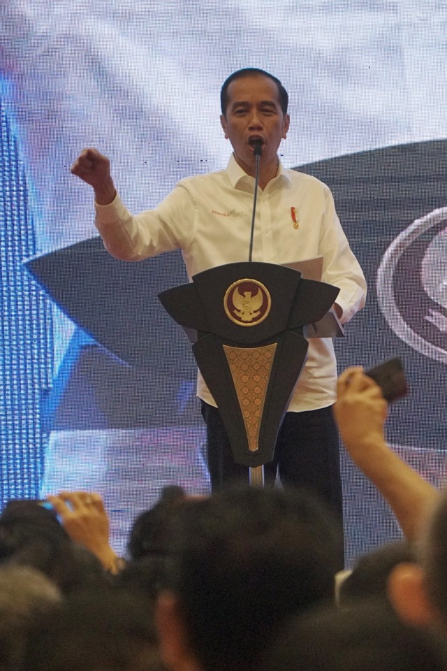 Presiden Joko Widodo memberikan sambutan dalam Kongres II Projo di JIExpo Kemayoran, Jakarta, Minggu (7/12). Foto: Fanny Kusumawardhani/kumparan